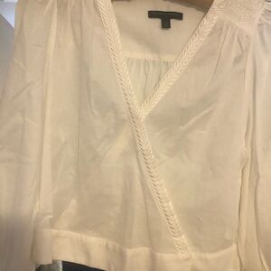 Banana Republic White partially embroidered white rare top.  Very elegant.
NWOT
